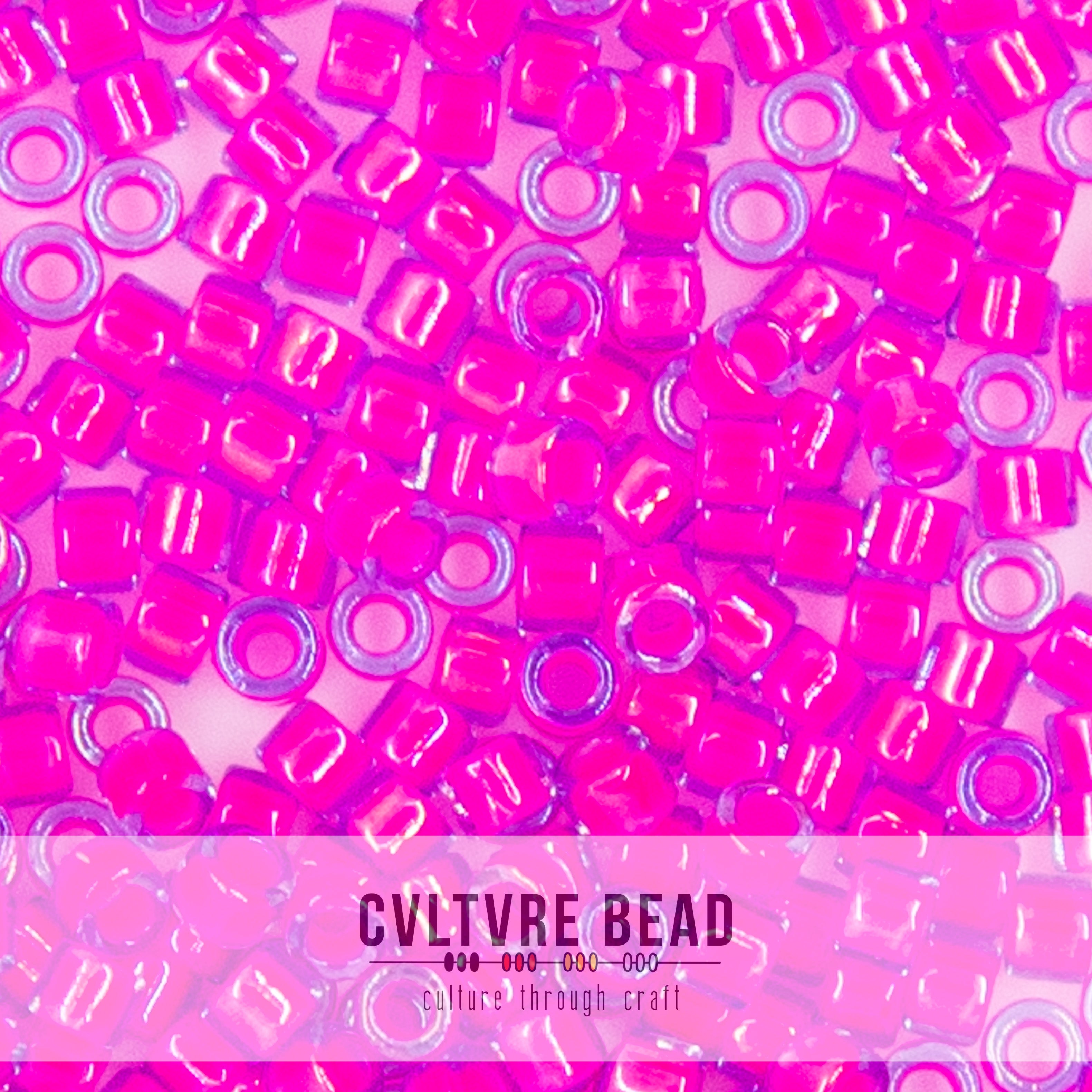 Toho Aiko 11/0 - 4g - Luminous Neon Pink-Lined Lt Sapphire